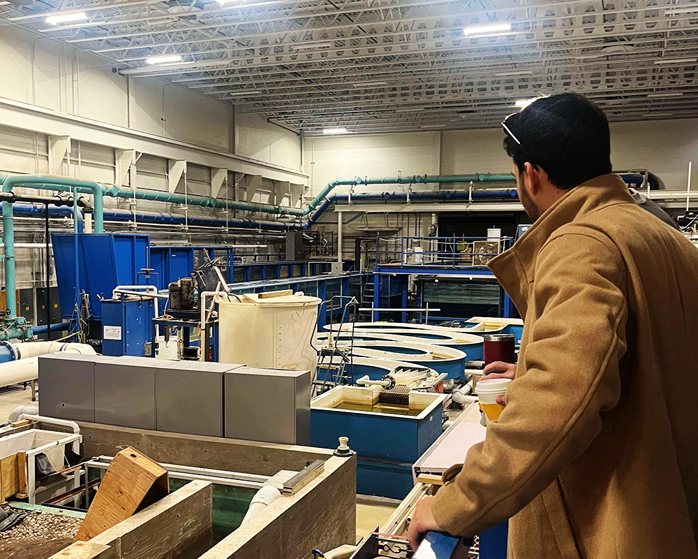 Godse touring the Ven Te Chow Hydrosystems Laboratory