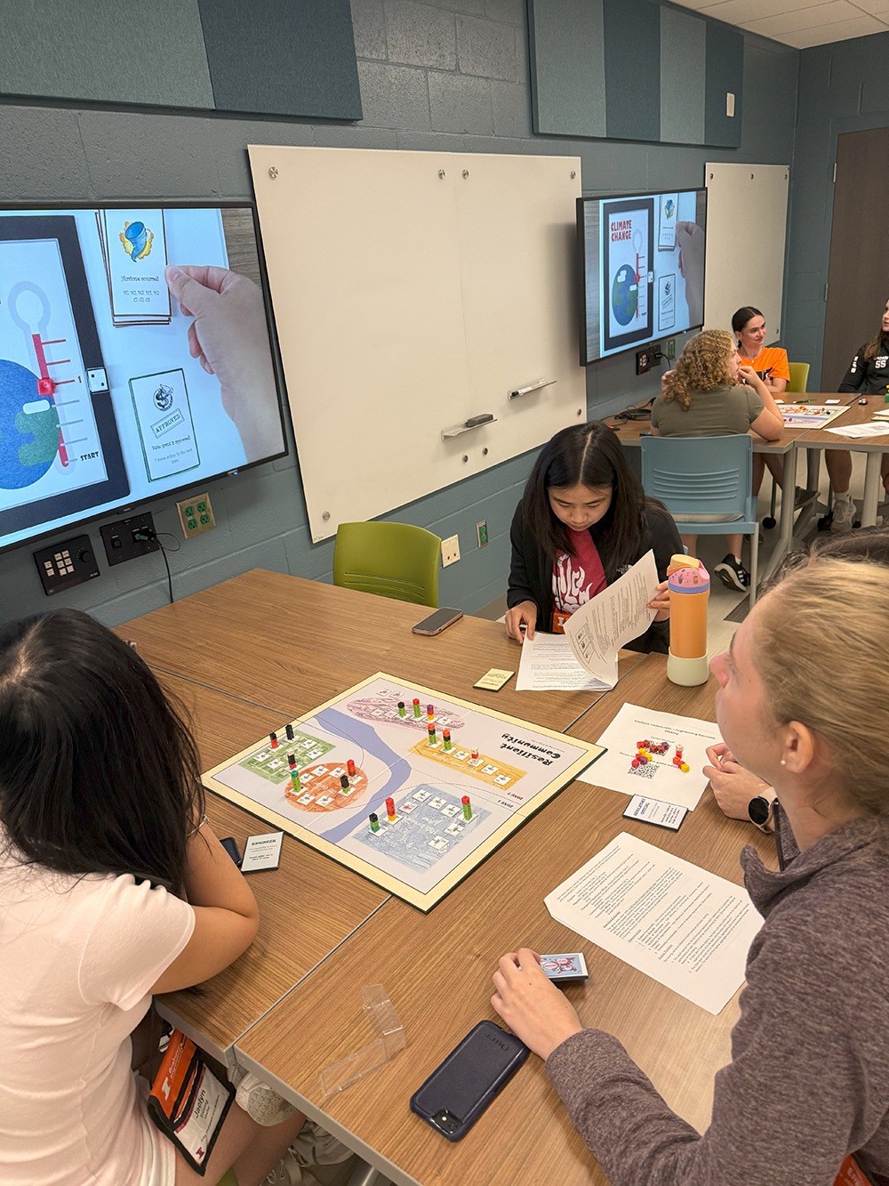 Through a board game designed by associate professor Eun Jeong Cha, students learned about the crucial role engineering decision making plays in building resilient communities. This game was developed through the Strategic Instructional Innovations Program (SIIP) and serves to introduce students to societal impact-based structural engineering risk management. It aims to enhance students' understanding and application of engineering decision-making in this critical field.