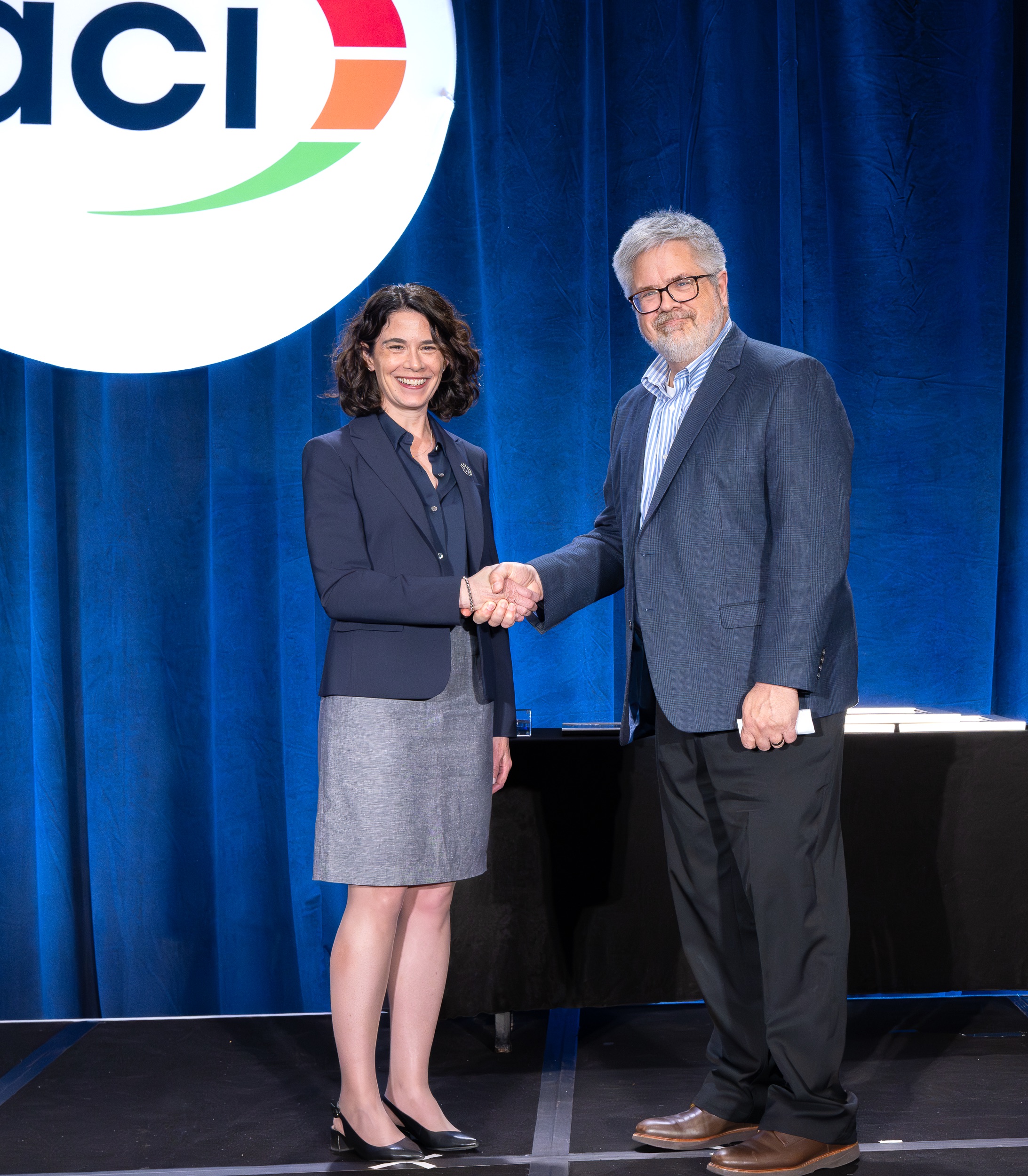 CEE Professor Emeritus David Lange receives Honorary Member recognition from ACI President Maria Juenger at 2026 Spring ACI Conference in Chicago, Ill.