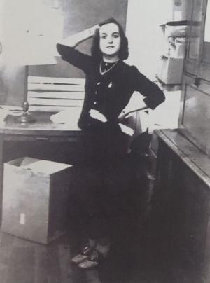 With slide rule in hand, Hauser poses for the camera in the Technograph office.