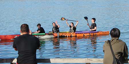 Students in a canoe on the water