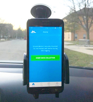App interfaces measure road roughness conditions.