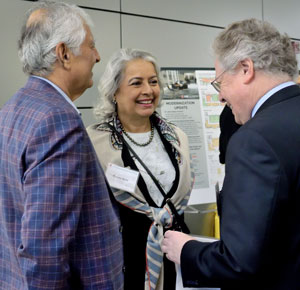 Smart Bridge donors Lalit Bahl and Kavita Kinra speak with Provost Andreas Cangellaris (right) before the groundbreaking ceremony.
