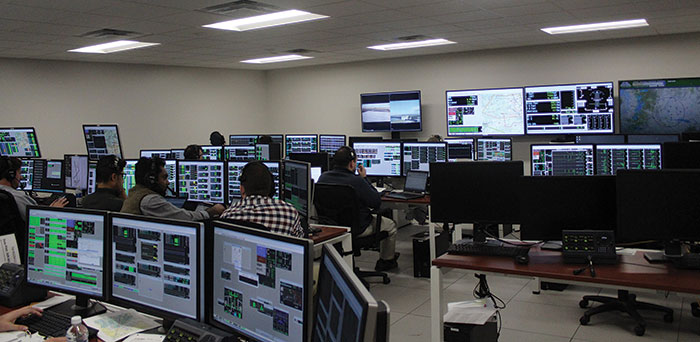 The telemetry room showing engineers analyzing data sent in real time from the aircraft during a test mission.