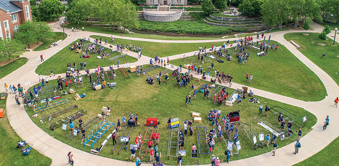 A drone captures an image of teams setting up for display judging in Bardeen Quad.