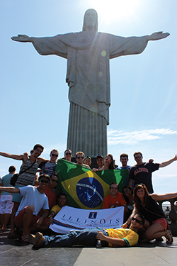 Students in Rio, Brazil at base of statue