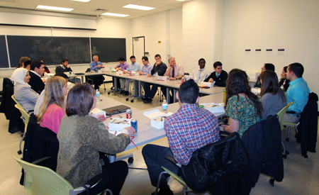 students and board members eat lunch together