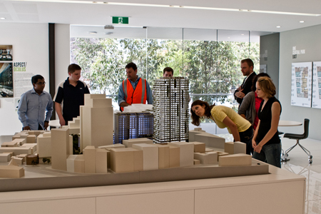 GLCM students view a model