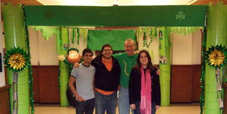 The four new CEE Knights of St. Patrick pose with the castle they built in Engineering Hall in February 2011.