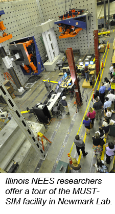 Illinois NEES researchers offer a tour of the MUST-SIM facility in Newmark Lab.