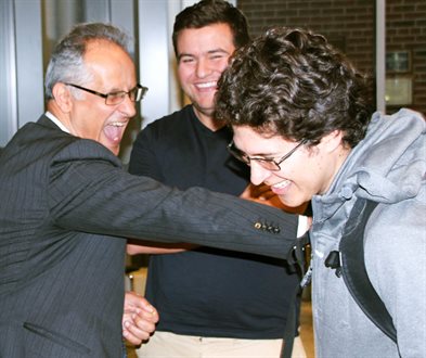Alumnus Joe Geagea (BS 81, MS 82) meets with students after giving a guest lecture.