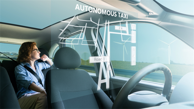 A passenger models what could be the future of autonomous and connected vehicles. The futuristic vehicles will be critical in providing community members who may not currently have access to transportation a feasible means to get from here to there.