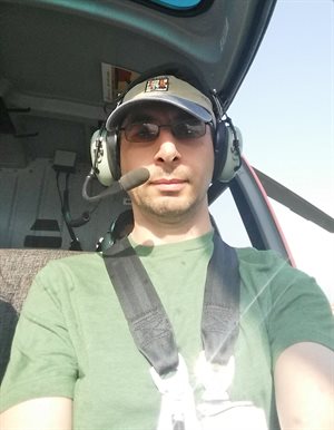 In a helicopter after performing earthquake reconnaissance in Nepal.