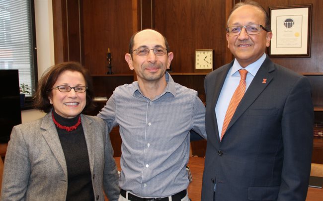 Youssef Hashash, center, with CEE Department Head Ana Barros and Grainger College of Engineering Dean Rashid Bashir.
