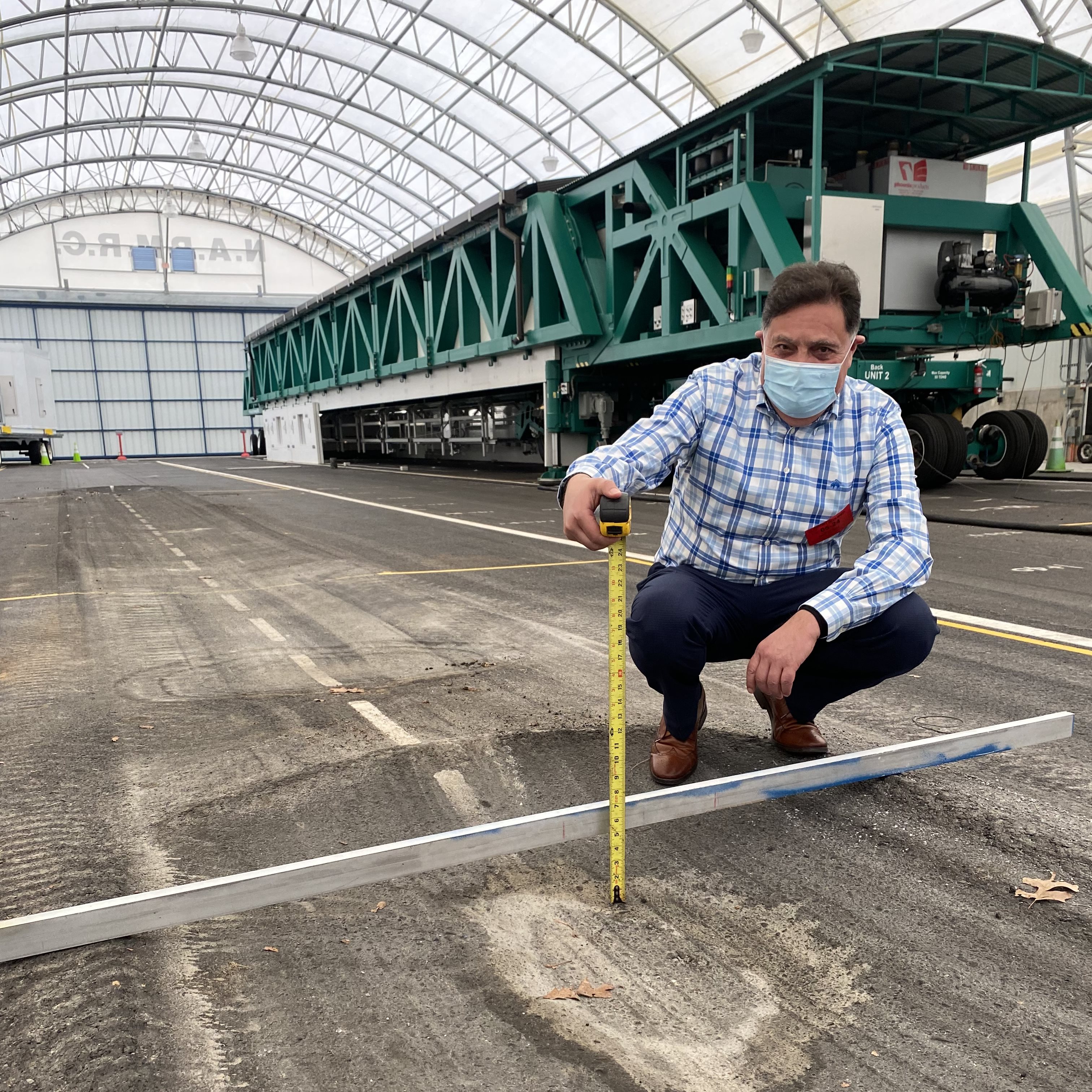 Imad Al-Qadi, UIUC Bliss Professor of Engineering and ICT director, measures pavement rutting after conducting research at FAA&amp;amp;amp;amp;rsquo;s National Airport Pavement and Materials Research Center. He and his students simulated loads from various airplane landing gear configurations and used the data to validate their developed model.