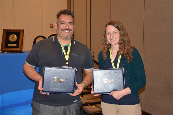 Joseph Kasprzyk and Ashlynn Stillwell accepted the award at the 2022 Environmental &amp; Water Resources Institute (EWRI) Congress.