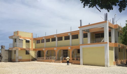 The O'Brien's first large project in 2010 after the quake was the medical/dental clinic at Citi Soleil campus. The second floor contains a vocational school; the clean water treatment room is on the far left. All the water rooms serve the community as well as the school and church.