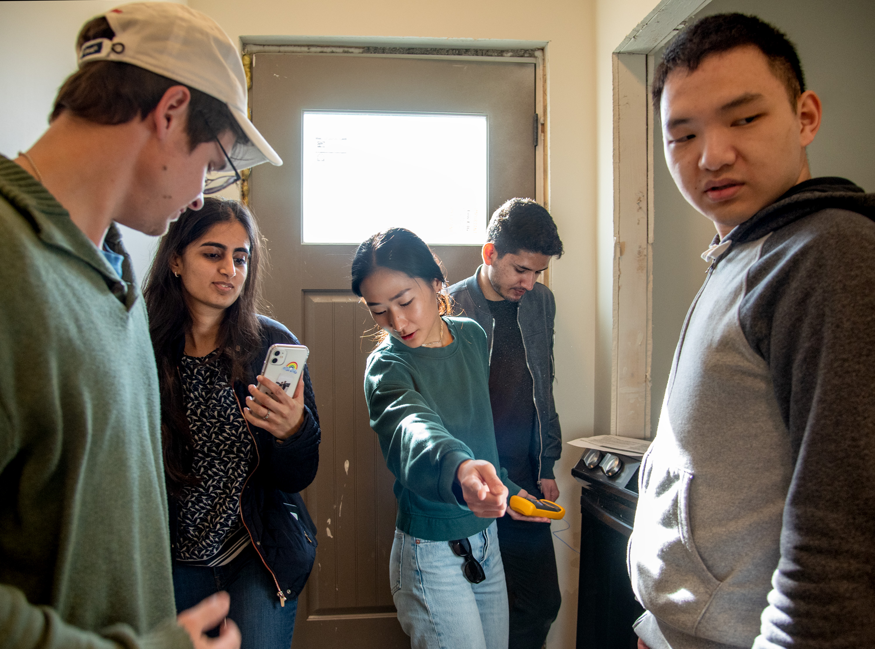 Christine Chung works with her crew at the house as work on the interior begins.