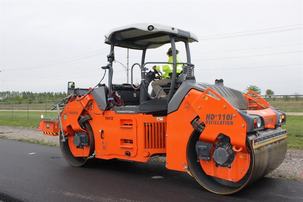 A construction worker uses a compactor with a ground-penetrating radar attached to an antenna on May 15. The technique, developed by Al-Qadi and colleagues is patent pending, allows users to measure density in real time as they compact pavement.&amp;amp;amp;nbsp;