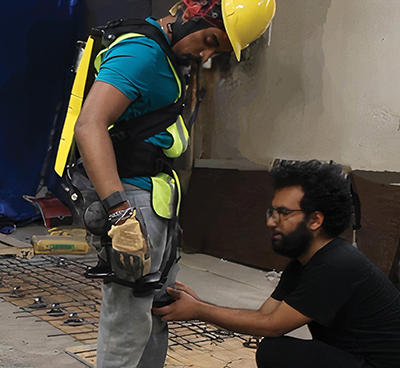 Amit Ojha, a doctoral student under the supervision of Assistant Professor Houtan Jebelli, evaluates the psychophysiological effects of wearable robots on construction workers, analyzing patterns in the subjects' brainwaves.