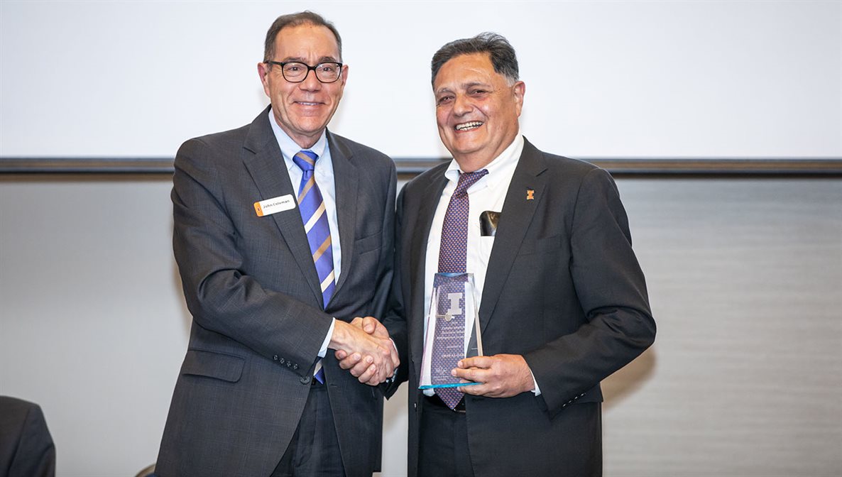 Imad Al-Qadi, right, receives the Executive Officer Distinguished Leadership Award from John Coleman, University of Illinois Urbana-Champaign Vice Chancellor for Academic Affairs and Provost.&amp;nbsp;